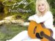 DOLLY PARTON DEBUTS LYRIC VIDEO FOR NEW TRACK "OUTSIDE YOUR DOOR"