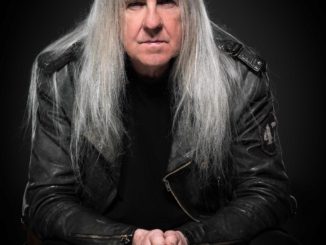 Legendary Saxon Frontman Launches Video For SCHOOL OF HARD KNOCKS
